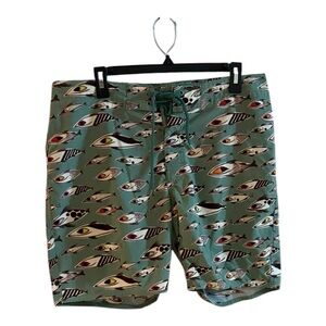Paul Frank board shorts featuring a repeating fish pattern size 34